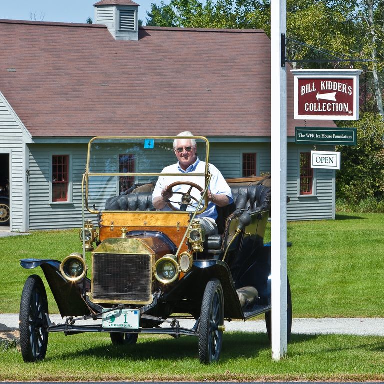 Model T parked by Ice House sign.